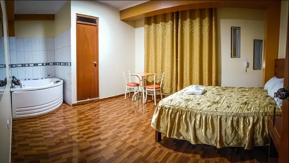 Habitación con jacuzzi y cama de 2 plazas